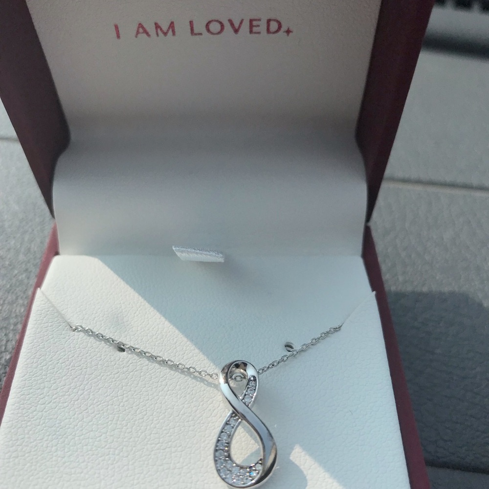 Sterling silver infinity; still in box never removed never wear jewelry anymore - Picture 5 of 5